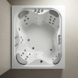 "Overhead view of a corner jacuzzi bathtub showcasing its shape and jet placement."