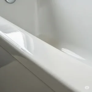 Close-up view of a perfectly smooth and chip-resistant finish on a bathtub, highlighting the high-quality result of epoxy paint for bathtub.