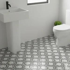 A luxurious master black and white tile floor bathroom with a large walk-in shower.