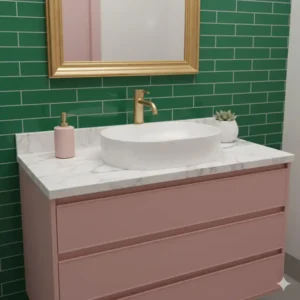 Close-up of a stylish pink bathroom vanity with a marble countertop, contrasted beautifully with a vibrant green tile accent wall.