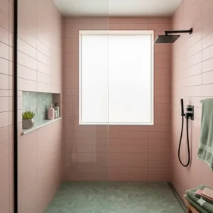 Walk-in shower with sage green mosaic floor tiles and blush pink wall tiles, creating a soft, cohesive look.