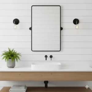 Sleek black metal farmhouse bathroom mirror providing a clean, industrial-farmhouse look. 