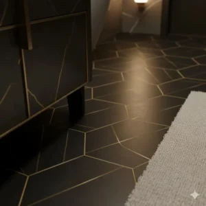 Sample of bold, geometric black and gold tile used as a statement floor in a stylish bathroom remodel. 
