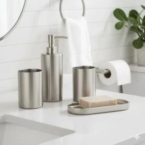 A matching set of brushed nickel bathroom accessories, including a towel bar and toilet paper holder, complementing the chosen best bathroom fixtures.